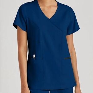 Grey’s Anatomy Kim 3-Pocket Crossover V-Neck Top in Indigo. BN in package .